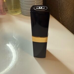 CHANEL Luxurious Black and Gold Lipstick